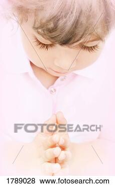 Stock Photo - girl in prayer.  fotosearch - search  stock photos,  pictures, wall  murals, images,  and photo clipart