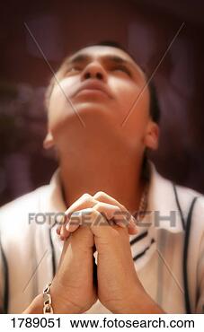 Stock Photography - man in prayer. 
fotosearch - search 
stock photos, 
pictures, images, 
and photo clipart