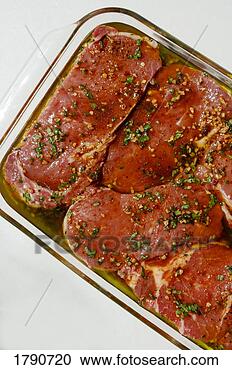 Stock Photography - marinating rib-eye 
steaks. fotosearch 
- search stock 
photos, pictures, 
images, and photo 
clipart
