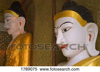 Stock Image - statues of buddhas, 
shwedagon pagoda, 
rangoon, myanmar. 
fotosearch - search 
stock photos, 
pictures, images, 
and photo clipart
