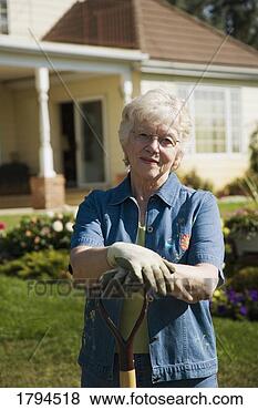 Stock Photo - senior woman gardening. 
fotosearch - search 
stock photos, 
pictures, images, 
and photo clipart