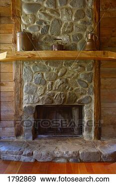 Stock Photograph - stone fireplace. 
fotosearch - search 
stock photos, 
pictures, images, 
and photo clipart