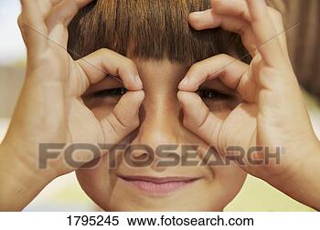 Stock Image - boy being playful. 
fotosearch - search 
stock photos, 
pictures, images, 
and photo clipart