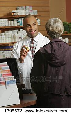 Stock Photo - pharmacist and 
patient. fotosearch 
- search stock 
photos, pictures, 
images, and photo 
clipart