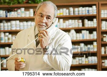 Stock Photo - pharmacist on 
the phone. fotosearch 
- search stock 
photos, pictures, 
images, and photo 
clipart