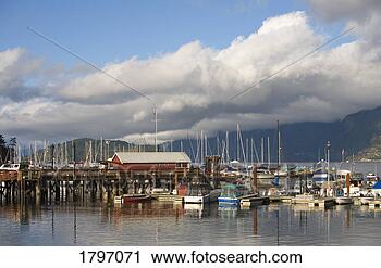 Stock Photography - boats docked at 
a harbor. fotosearch 
- search stock 
photos, pictures, 
images, and photo 
clipart