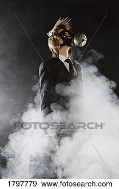 Stock Photograph - businessman wearing 
a gas mask. fotosearch 
- search stock 
photos, pictures, 
images, and photo 
clipart