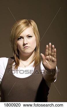 Stock Photography - female with hand 
out palm facing 
out. fotosearch 
- search stock 
photos, pictures, 
images, and photo 
clipart