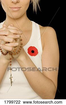Stock Photo - lady with prayer 
beads. fotosearch 
- search stock 
photos, pictures, 
images, and photo 
clipart