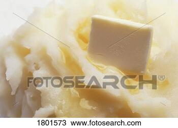 Stock Photo - mashed potatoes 
with butter melting 
on them. fotosearch 
- search stock 
photos, pictures, 
images, and photo 
clipart