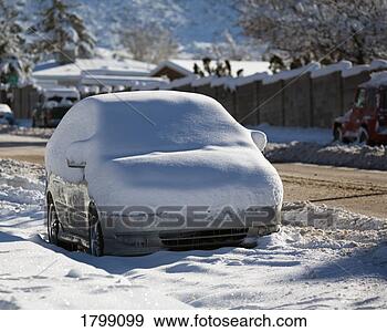 Stock Photograph - snow-covered car. 
fotosearch - search 
stock photos, 
pictures, images, 
and photo clipart