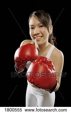 Stock Image - woman in boxing 
gloves. fotosearch 
- search stock 
photos, pictures, 
images, and photo 
clipart
