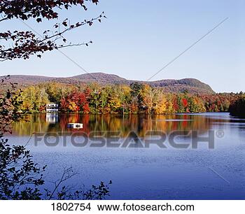 Stock Photo - autumn colours 
reflected in lake. 
fotosearch - search 
stock photos, 
pictures, images, 
and photo clipart