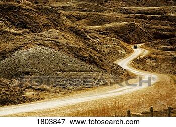 Picture - a car running 
on curving road. 
fotosearch - search 
stock photos, 
pictures, images, 
and photo clipart