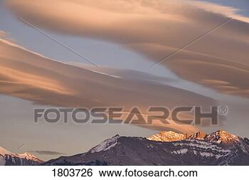 Stock Photo - clouds at sunset 
above mountain 
peaks,  kootenay 
plains,  alberta. 
fotosearch - search 
stock photos, 
pictures, images, 
and photo clipart