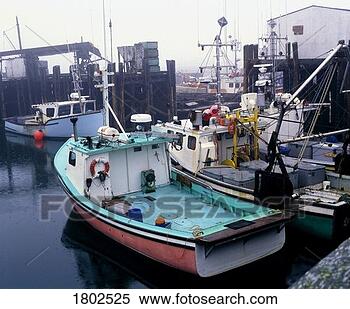 Stock Image - fishing boats 
in a harbour. 
fotosearch - search 
stock photos, 
pictures, images, 
and photo clipart