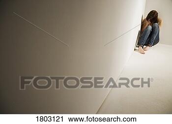 Stock Photography - girl huddled in 
corner. fotosearch 
- search stock 
photos, pictures, 
images, and photo 
clipart