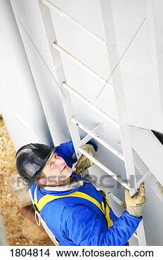 Stock Photo - high angle view 
of a worker climbing 
a ladder. fotosearch 
- search stock 
photos, pictures, 
images, and photo 
clipart
