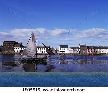 Stock Image - historic galway  hooker, near the  spanish arch,  galway city, ireland.  fotosearch - search  stock photos,  pictures, images,  and photo clipart