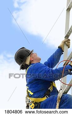 Stock Photo - industry worker 
climbing a ladder. 
fotosearch - search 
stock photos, 
pictures, images, 
and photo clipart