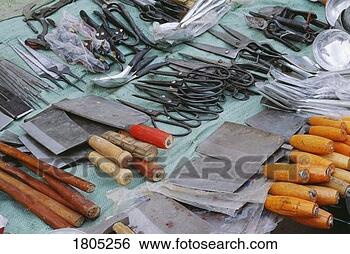 Stock Photo - knives and scissors 
for sale at a 
market. fotosearch 
- search stock 
photos, pictures, 
images, and photo 
clipart