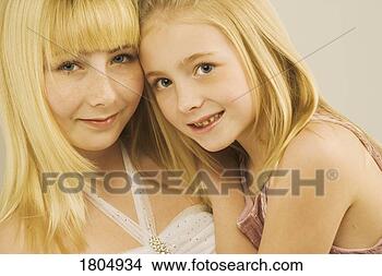 Stock Photo - portrait of two 
young girls. fotosearch 
- search stock 
photos, pictures, 
images, and photo 
clipart
