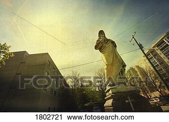 Stock Photography - religious statue 
in the city. fotosearch 
- search stock 
photos, pictures, 
images, and photo 
clipart