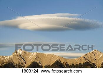 Stock Photo - saucer-shaped 
cloud, kootenay 
plains, alberta, 
canada. fotosearch 
- search stock 
photos, pictures, 
images, and photo 
clipart