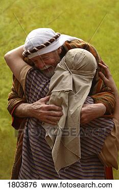 Stock Photo - a senior man hugging 
another person 
both dressed in 
robes and cloths. 
fotosearch - search 
stock photos, 
pictures, images, 
and photo clipart