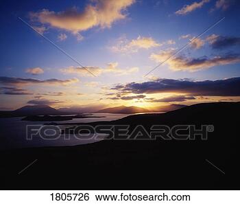 Stock Photo - sunbursts from 
valentia island, 
 douglas head 
to cahirciveen, 
 co. fotosearch 
- search stock 
photos, pictures, 
images, and photo 
clipart