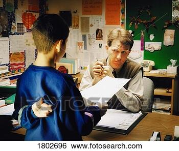 Stock Photo - teacher talking 
to student. fotosearch 
- search stock 
photos, pictures, 
images, and photo 
clipart