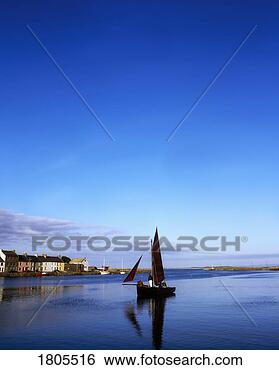 Stock Photo - traditional galway 
hooker, river 
corrib, galway 
city, ireland. 
fotosearch - search 
stock photos, 
pictures, images, 
and photo clipart