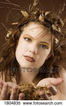 Stock Image - woman dressed 
up as autumn. 
fotosearch - search 
stock photos, 
pictures, images, 
and photo clipart