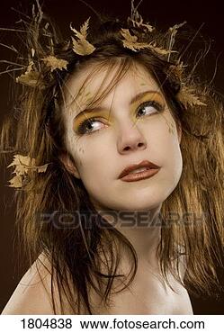 Stock Photo - woman dressed 
up as autumn. 
fotosearch - search 
stock photos, 
pictures, images, 
and photo clipart
