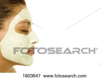 Picture - woman with facial 
mask. fotosearch 
- search stock 
photos, pictures, 
images, and photo 
clipart