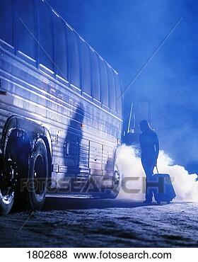 Stock Photo - woman getting 
on bus in winter. 
fotosearch - search 
stock photos, 
pictures, images, 
and photo clipart