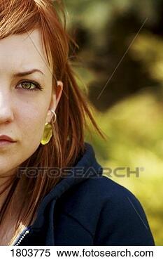 Stock Image - a woman looking 
at the camera. 
fotosearch - search 
stock photos, 
pictures, images, 
and photo clipart
