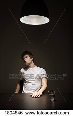 Stock Photo - young man being 
interrogated. 
fotosearch - search 
stock photos, 
pictures, images, 
and photo clipart