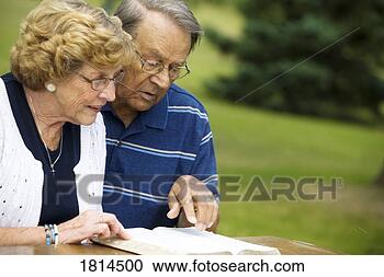 Stock Photography - senior couple 
reading the bible. 
fotosearch - search 
stock photos, 
pictures, images, 
and photo clipart