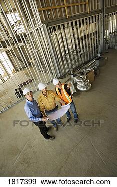 Stock Photograph - construction workers 
and architects. 
fotosearch - search 
stock photos, 
pictures, images, 
and photo clipart