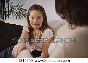 Stock Photograph - daughter with 
bad news. fotosearch 
- search stock 
photos, pictures, 
images, and photo 
clipart