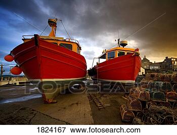 Picture - fishing boats 
out of the water 
for winter, northumberland, 
england. fotosearch 
- search stock 
photos, pictures, 
images, and photo 
clipart