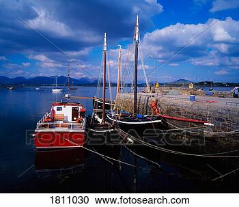 Stock Photography - hookers in roundstone 
harbour, connemara, 
co galway, ireland. 
fotosearch - search 
stock photos, 
pictures, images, 
and photo clipart