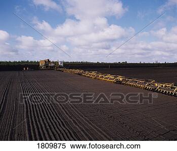 Stock Image - industrial turf 
production, ireland. 
fotosearch - search 
stock photos, 
pictures, images, 
and photo clipart