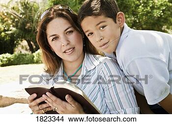 Stock Photo - mother and son 
reading the bible. 
fotosearch - search 
stock photos, 
pictures, images, 
and photo clipart