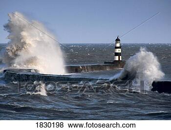 Stock Photo - waves crashing 
by lighthouse, 
seaham, teesside, 
england. fotosearch 
- search stock 
photos, pictures, 
images, and photo 
clipart