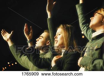 Stock Photograph - a group worshipping. 
fotosearch - search 
stock photos, 
pictures, images, 
and photo clipart