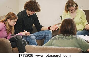 Stock Photo - prayer group. 
fotosearch - search 
stock photos, 
pictures, images, 
and photo clipart