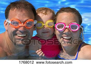 Stock Photo - portrait of happy 
family in swimming 
pool. fotosearch 
- search stock 
photos, pictures, 
images, and photo 
clipart