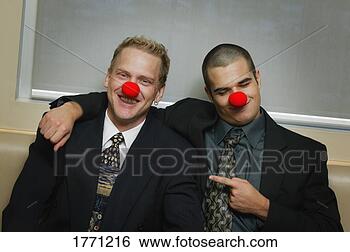 Stock Photo - two businessmen 
being silly wearing 
red noses. fotosearch 
- search stock 
photos, pictures, 
images, and photo 
clipart